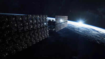 A big satellite with thousands of mirrors in space reflecting sunlight on the dark part of the earth.jpeg