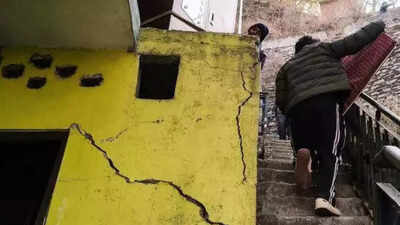 A house in shimla shows deep cracks linked to the under construction nhai tunnel work.jpg