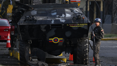 A member of the national guard stands guard at fuerte tiuna venezuela39s largest military complex in.png