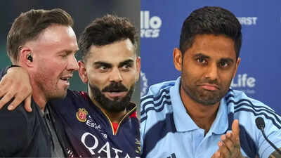 Ab de villiers with virat kohli and suryakumar yadav photos by pti.jpg