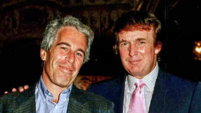 Epstein with trump file image.jpg