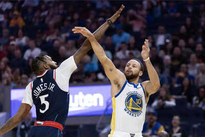 Golden state warriors guard stephen curry 30 is fouled by los angeles clippers forward derrick jones.jpeg