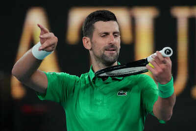 Sinner overcomes cramps heat to continue australian open title defense djokovic gets 400th win.jpg