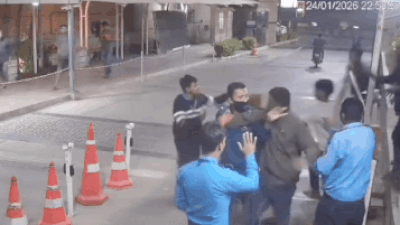 Stopped at gate gig worker returns with group.jpg