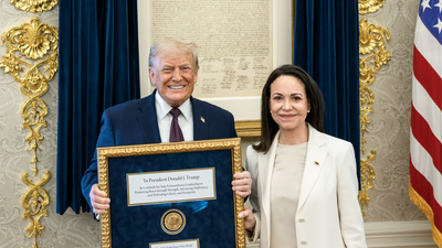 Trump accepts the nobel peace prize from machado.jpg