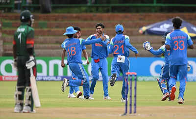 Vihaan malhotra celebrates with teammates.jpg