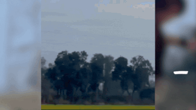 While anuj was recording the video faizan climbed onto a high support wall at the edge of the bridge.gif