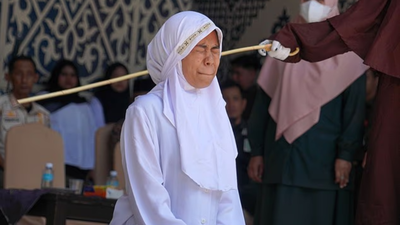 Women being caned x.jpg