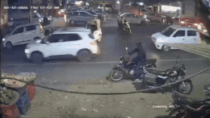 Eyewitnesses alleged that when locals tried to stop the car after it first hit a motorcycle the driv.gif