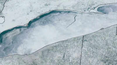 From canada to ohio an 80 mile ice crack rips across lake erie and it is visible from space.jpg