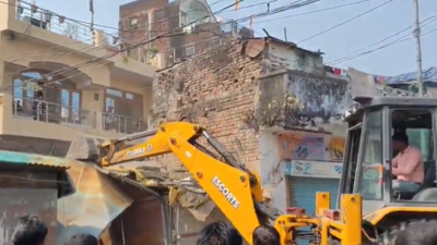 In lakhimpur kheri a barber shop was demolished following protests over the alleged rape of an eight.png