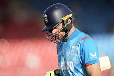 England39s jos buttler walks off the field after his dismissal during the icc cha.jpg