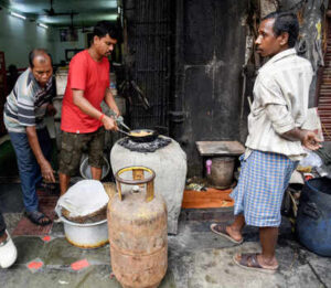 Kolkata mar 12 ani food seller shop vendors cook using coal fired ovens amid.jpg